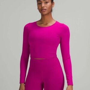 Lululemon Athletica Wunder Train Cropped Long Sleeve in Ripened Raspberry